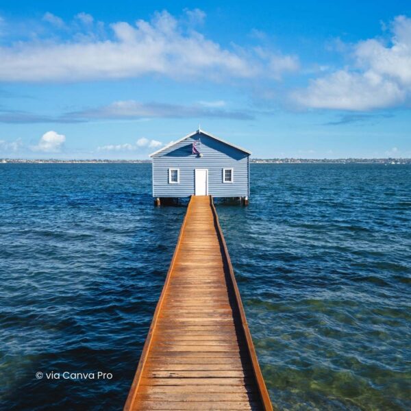 House on the end of a long boardwalk out in to the ocean